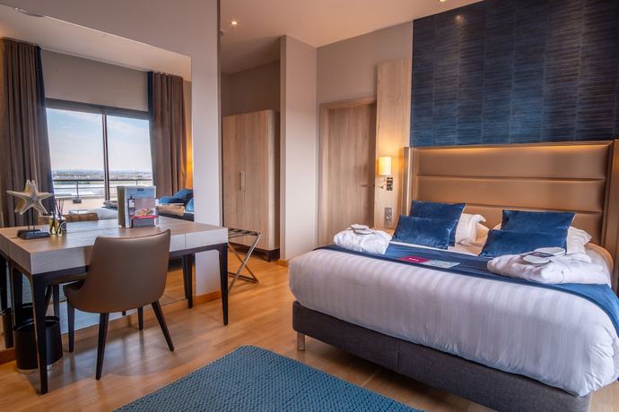 Imagen de la habitación del Hotel Kyriad Prestige Lyon Est - Saint Priest Eurexpo and Spa. Foto 7