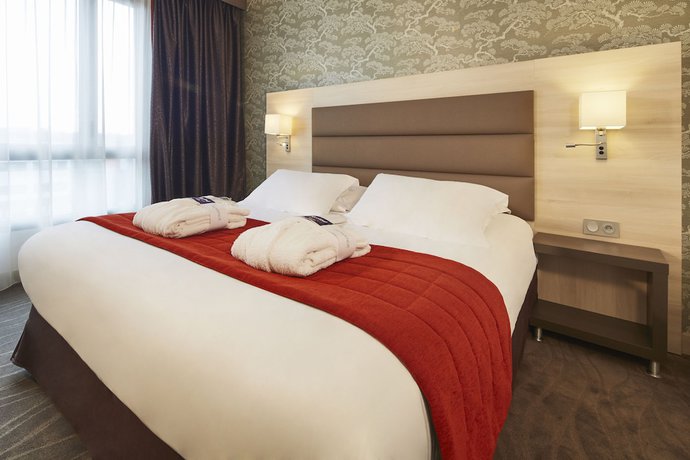 Imagen de la habitación del Hotel Kyriad Prestige Lyon Est - Saint Priest Eurexpo and Spa. Foto 8