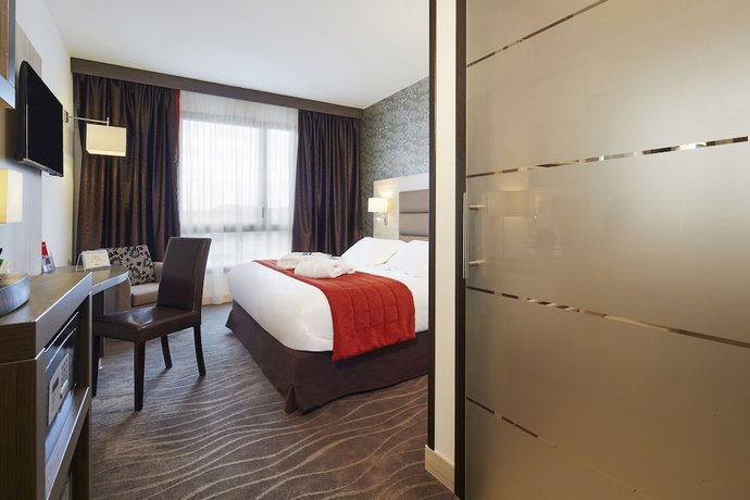 Imagen de la habitación del Hotel Kyriad Prestige Lyon Est - Saint Priest Eurexpo and Spa. Foto 10