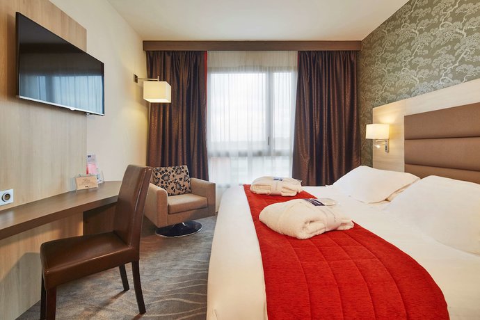 Imagen de la habitación del Hotel Kyriad Prestige Lyon Est - Saint Priest Eurexpo and Spa. Foto 13