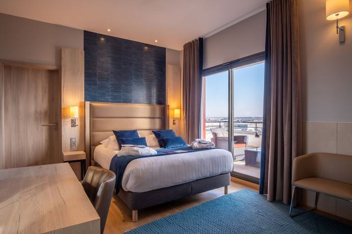 Imagen de la habitación del Hotel Kyriad Prestige Lyon Est - Saint Priest Eurexpo and Spa. Foto 16