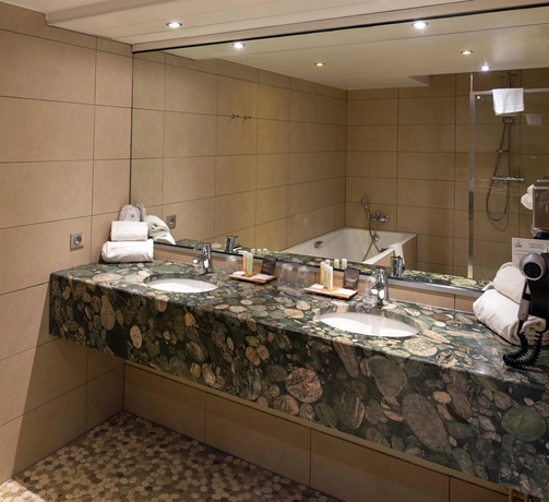 Imagen de la habitación del Hotel Kyriad Prestige Mulhouse - Basel. Foto 11