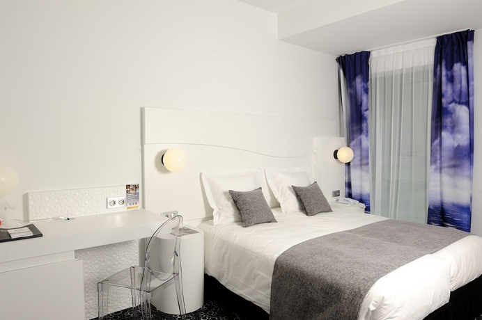 Imagen de la habitación del Hotel Kyriad Prestige Perpignan Centre Del Mon. Foto 12