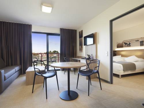 Imagen de la habitación del Hotel Kyriad Prestige Residence and Spa Cabourg - Dives-sur-mer. Foto 4