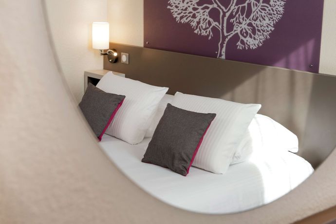 Imagen de la habitación del Hotel Kyriad Saint Etienne Centre. Foto 2