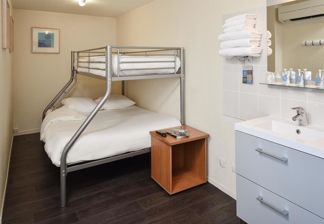 Imagen de la habitación del Hotel Kyriad Saint Etienne Centre. Foto 14