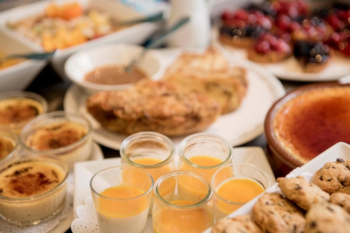 Imagen del bar/restaurante del Hotel Kyriad Saint Etienne Centre. Foto 7