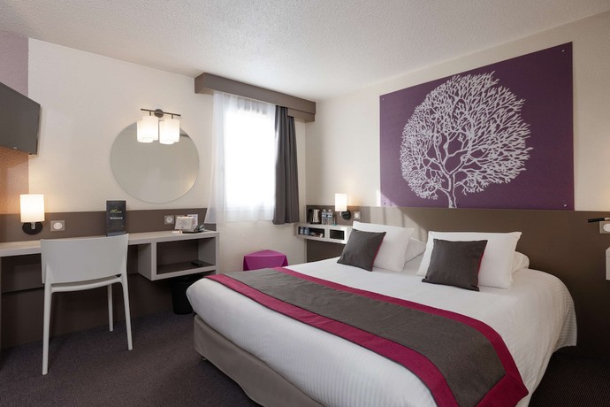 Imagen de la habitación del Hotel Kyriad Saint Etienne Centre. Foto 8