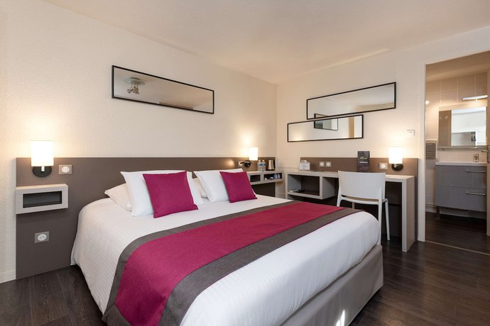Imagen de la habitación del Hotel Kyriad Saint Etienne Centre. Foto 9