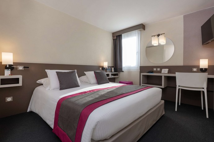 Imagen de la habitación del Hotel Kyriad Saint Etienne Centre. Foto 10