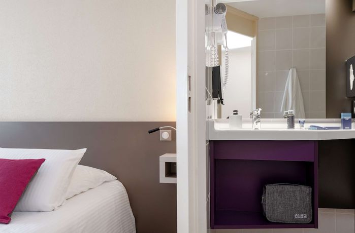 Imagen de la habitación del Hotel Kyriad Saint Etienne Centre. Foto 14