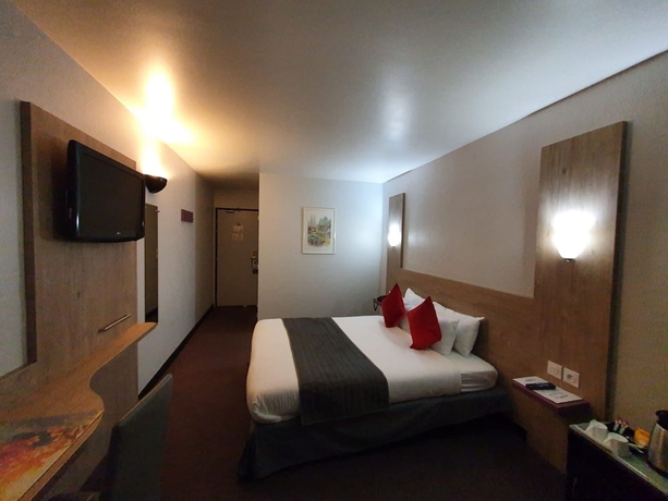 Imagen de la habitación del Hotel Kyriad Saint Fargeau Ponthierry Apollonia. Foto 16