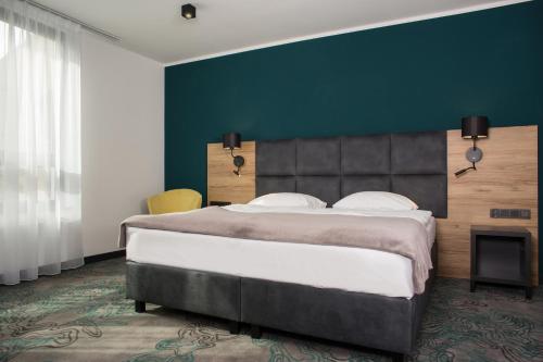 Imagen de la habitación del Hotel Kyriad Stargard. Foto 19