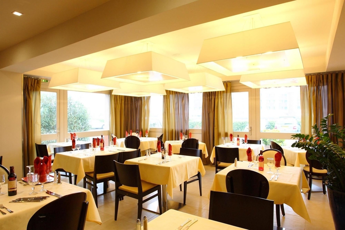 Imagen del bar/restaurante del Hotel Kyriad Toulouse Blagnac Aéroport. Foto 2