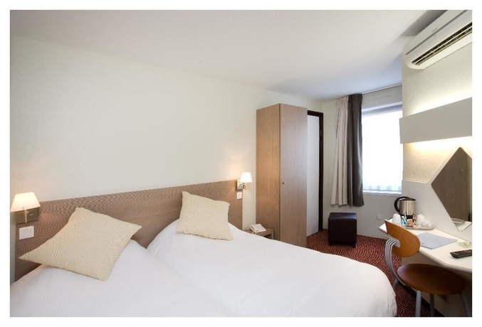 Imagen de la habitación del Hotel Kyriad Villefranche Sur Saone. Foto 12