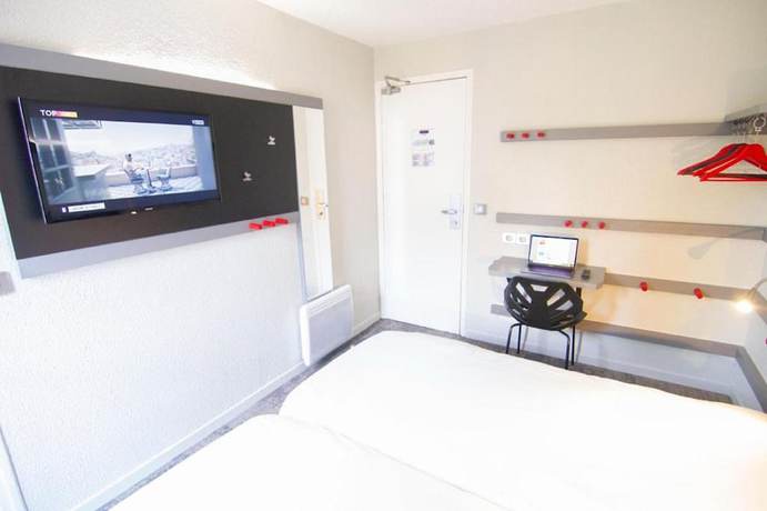 Imagen de la habitación del Hotel Kyriad direct Trappes. Foto 7