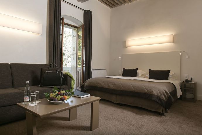 Imagen de la habitación del Hotel L Abbaye De Talloires. Foto 10