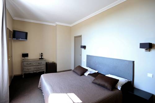 Imagen de la habitación del Hotel L' Abbaye H&ocirc;tel. Foto 9