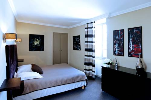 Imagen de la habitación del Hotel L' Abbaye H&ocirc;tel. Foto 10