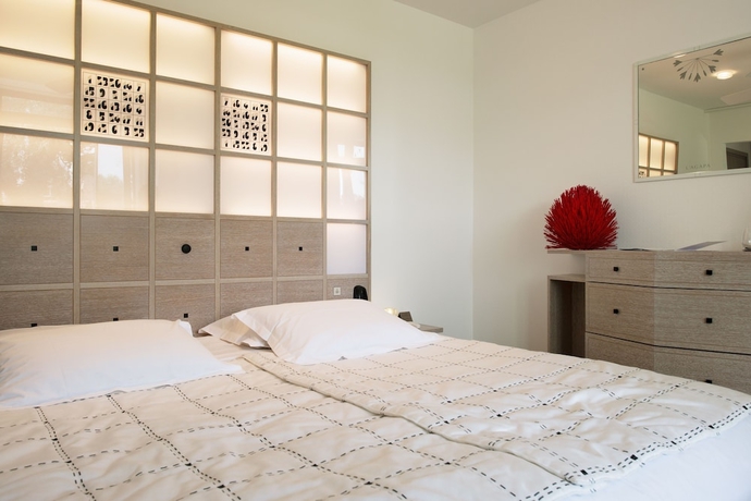 Imagen de la habitación del Hotel L' Agapa Spa. Foto 17