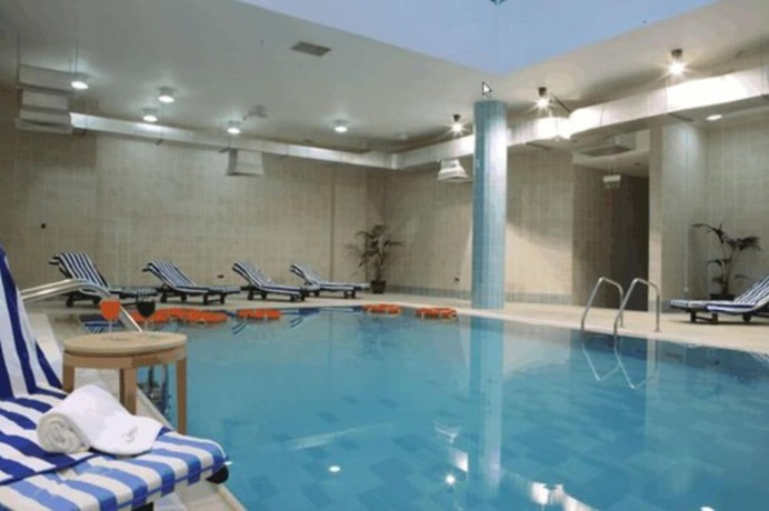 Imagen de la piscina del Hotel L' Arabia Apartments. Foto 20