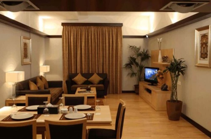 Imagen de la habitación del Hotel L' Arabia Apartments. Foto 12