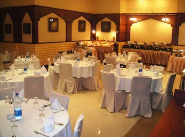Imagen del bar/restaurante del Hotel L' Arabia Apartments. Foto 5