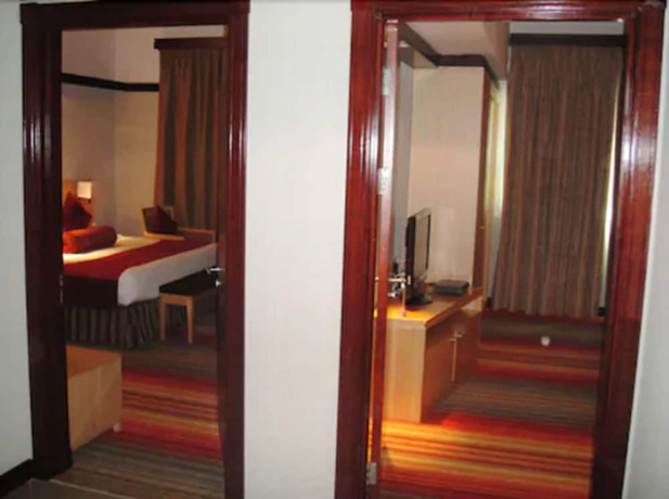 Imagen de la habitación del Hotel L' Arabia Apartments. Foto 14