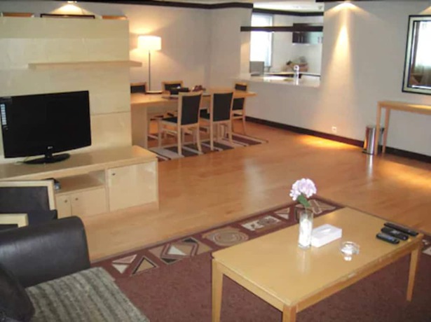 Imagen de la habitación del Hotel L' Arabia Apartments. Foto 15