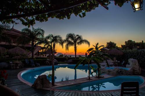 Imagen de la habitación del Hotel L' Arcobaleno Resort. Foto 2