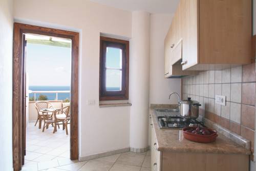 Imagen de la habitación del Hotel L' Arcobaleno Resort. Foto 4