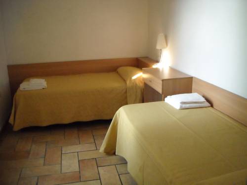 Imagen de la habitación del Hotel L' Arcobaleno Resort. Foto 13