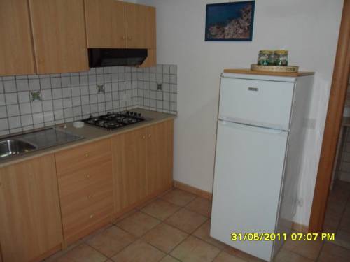 Imagen de la habitación del Hotel L' Arcobaleno Resort. Foto 14