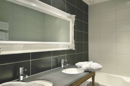 Imagen de la habitación del Hotel L' Auberge De Maison Rouge. Foto 14