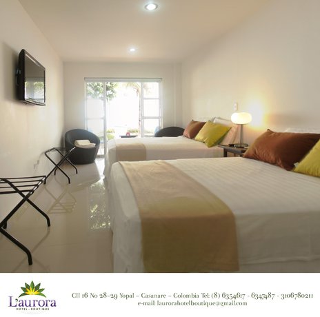 Imagen de la habitación del Hotel L Aurora Boutique. Foto 11