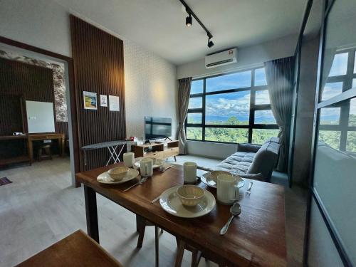 Imagen de la habitación del Hotel L Homestay JesseltonQuay JQ KK City亚庇市区中心民宿2房1厕. Foto 11