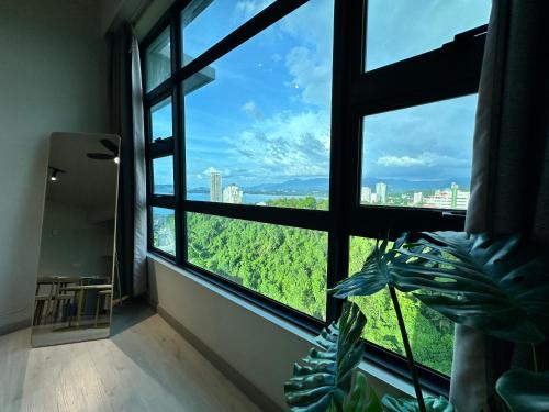 Imagen de la habitación del Hotel L Homestay JesseltonQuay JQ KK City亚庇市区中心民宿2房1厕. Foto 16