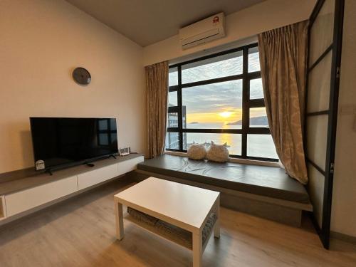 Imagen de la habitación del Hotel L Homestay JesseltonQuay JQ KK City亚庇市区中心民宿2房1厕. Foto 19