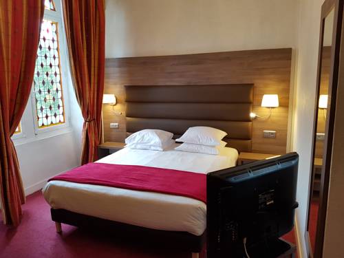 Imagen de la habitación del Hotel L' Hostellerie du Ch&acirc;teau. Foto 6