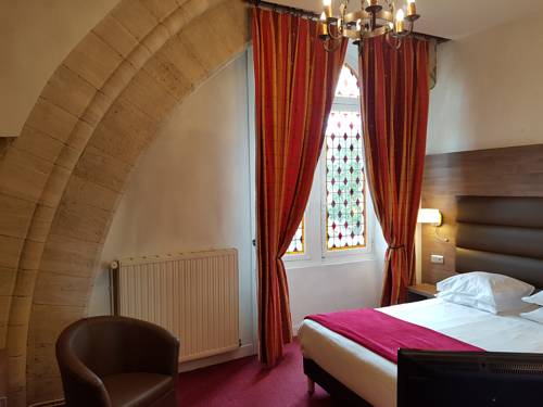Imagen de la habitación del Hotel L' Hostellerie du Ch&acirc;teau. Foto 7