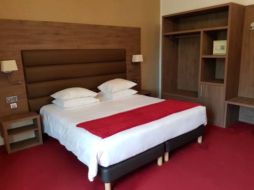 Imagen de la habitación del Hotel L' Hostellerie du Ch&acirc;teau. Foto 8