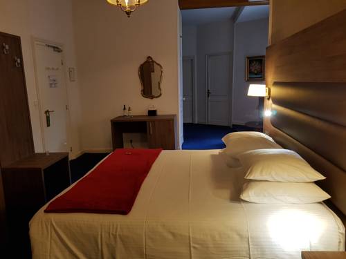 Imagen de la habitación del Hotel L' Hostellerie du Ch&acirc;teau. Foto 9