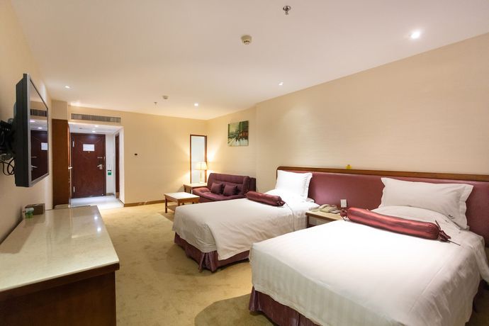 Imagen de la habitación del Hotel L Lianhua. Foto 11