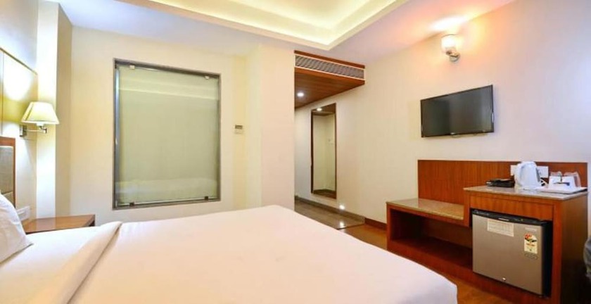 Imagen de la habitación del Hotel L N Marriott. Foto 5