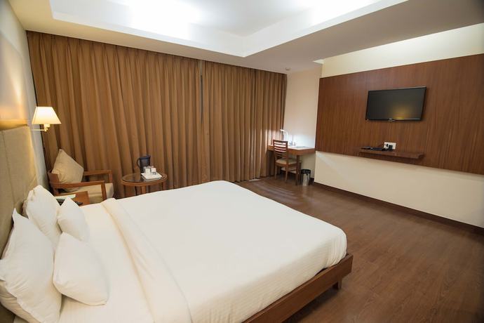 Imagen de la habitación del Hotel L N Marriott. Foto 8