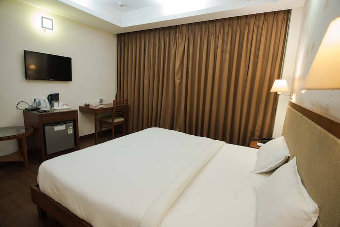 Imagen de la habitación del Hotel L N Marriott. Foto 13
