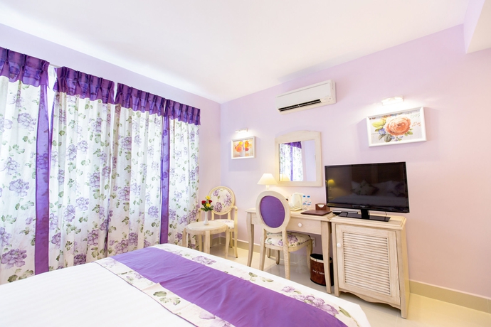 Imagen de la habitación del Hotel L Odeon Phu My Hung. Foto 9