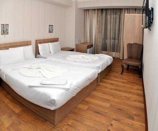 Imagen de la habitación del Hotel L Plaza. Foto 6