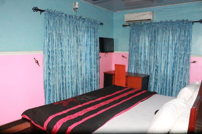 Imagen de la habitación del Hotel L and L Executives and Suites. Foto 5