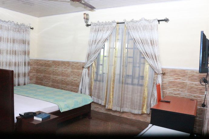 Imagen de la habitación del Hotel L and L Executives and Suites. Foto 6